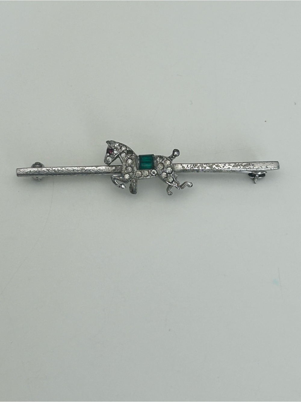 Silver Horse Bar Brooch with Green Center Stone